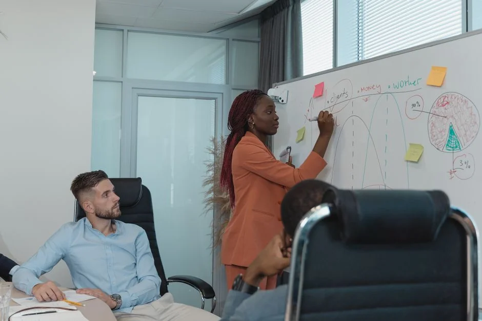 Sticky notes with holiday marketing ideas for Christmas social media and email campaigns.